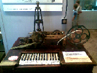 The Hughes telegraph, the first telegraph printing text on a paper tape; this one was manufactureed by Siemens and Halske, Germany (Warsaw Muzeum Techniki).